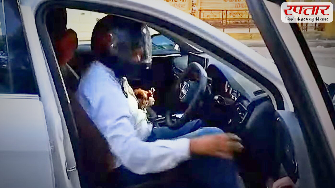 Man driving Audi car after wearing helmet